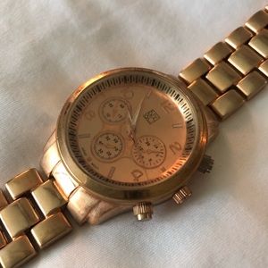 Rose gold large-faced watch